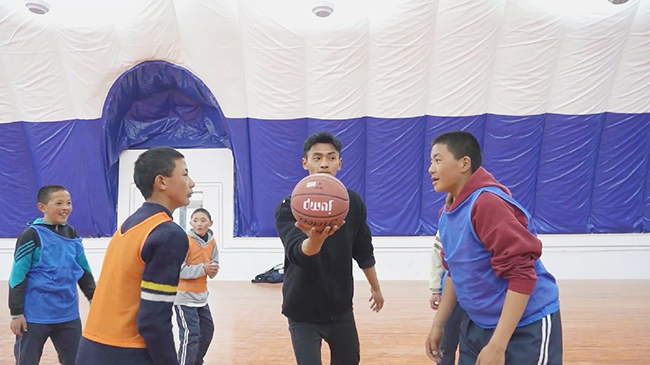Inflatable stadium breathes life into basketball dreams at high-altitude Chinese school.jpg