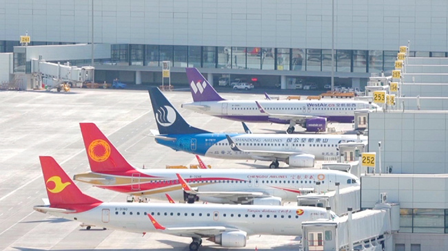 China cuts domestic flight fuel surcharges.jpg China cuts domestic flight fuel surcharges.jpg